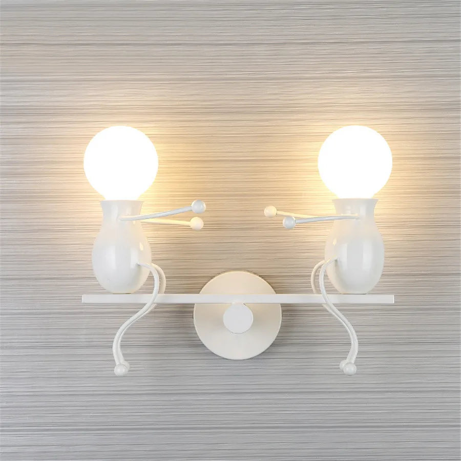 Creative Little Figurine on Swing Wall Sconces - Lumen Attic