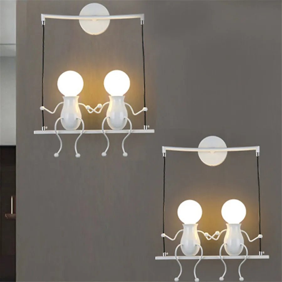 Creative Little Figurine on Swing Wall Sconces - Lumen Attic