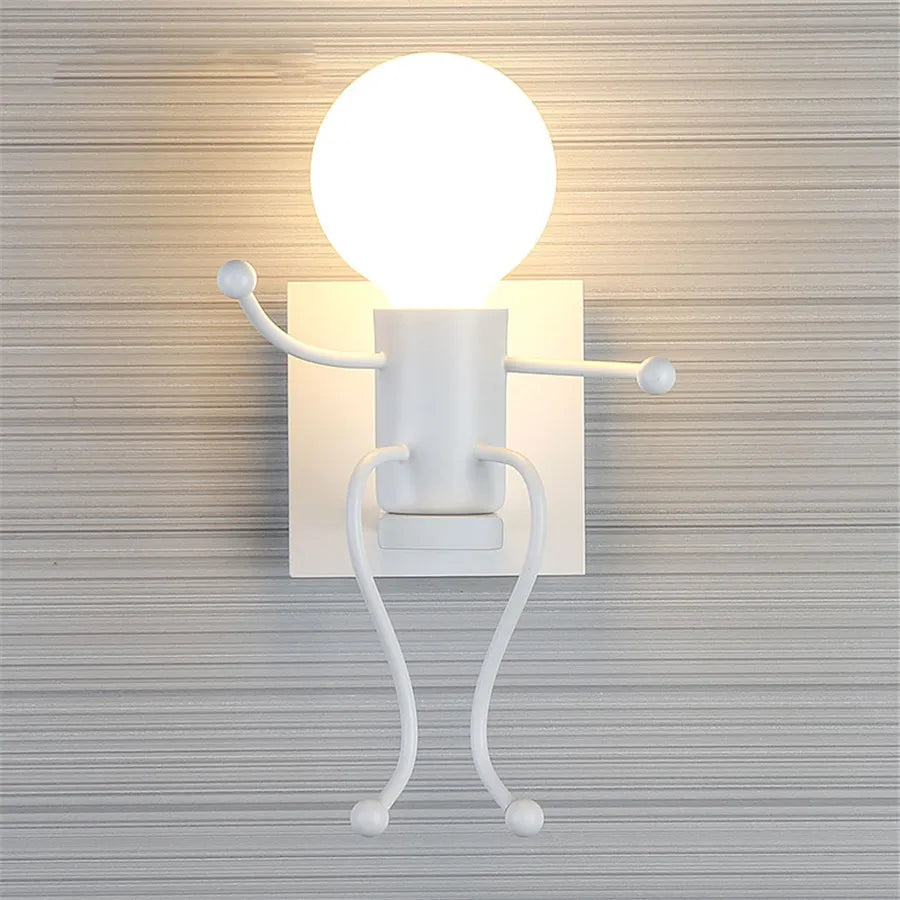 Creative Little Figurine on Swing Wall Sconces - Lumen Attic