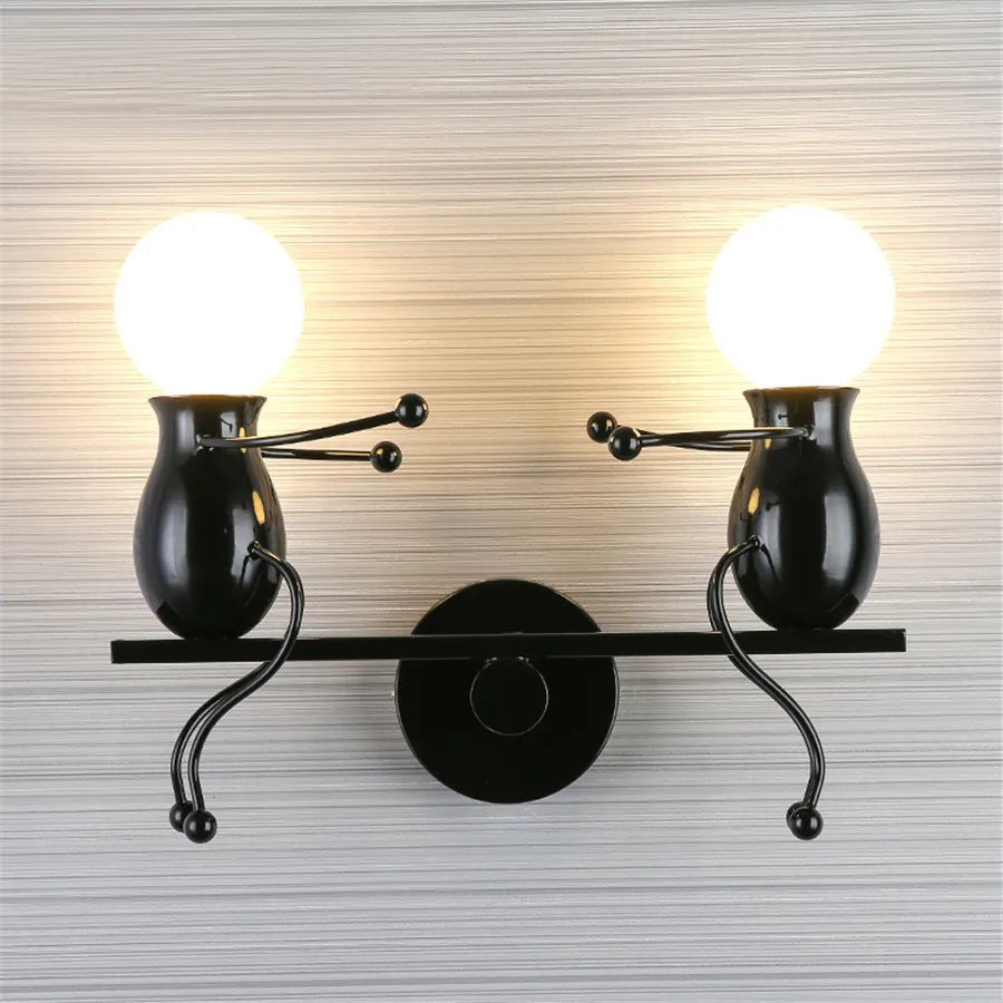 Creative Little Figurine on Swing Wall Sconces - Lumen Attic