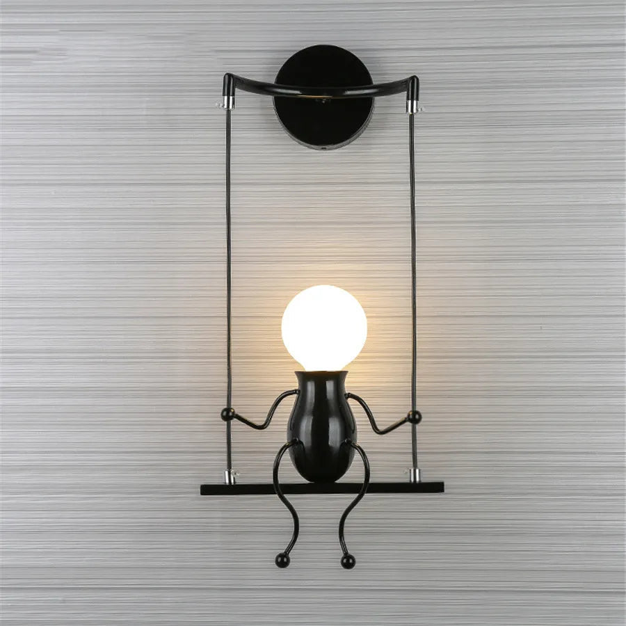 Creative Little Figurine on Swing Wall Sconces - Lumen Attic