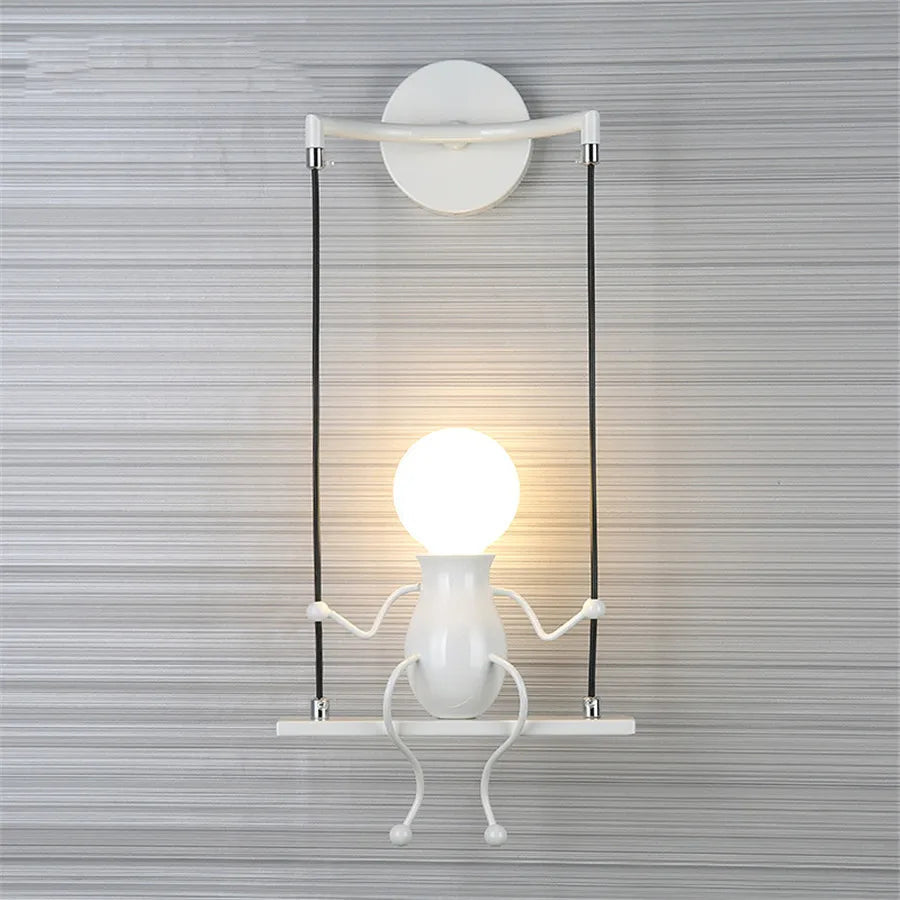 Creative Little Figurine on Swing Wall Sconces - Lumen Attic