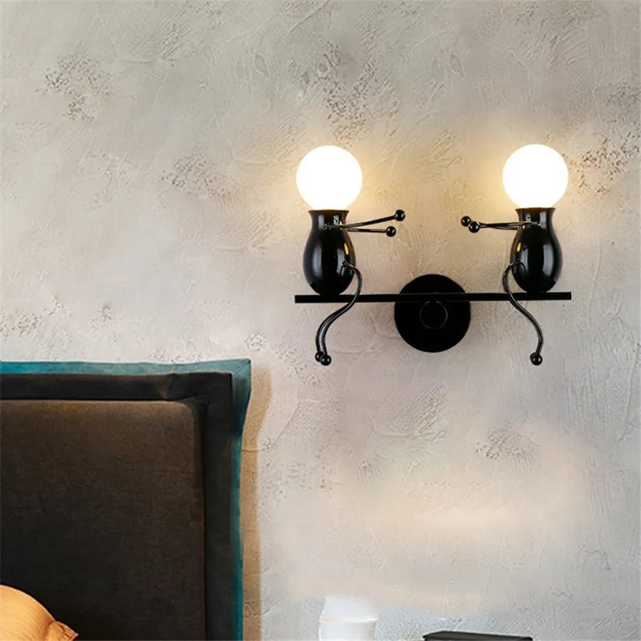 Creative Little Figurine on Swing Wall Sconces - Lumen Attic