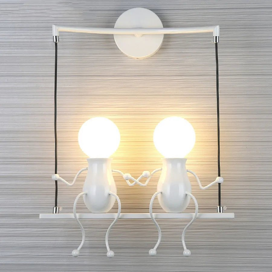 Creative Little Figurine on Swing Wall Sconces - Lumen Attic