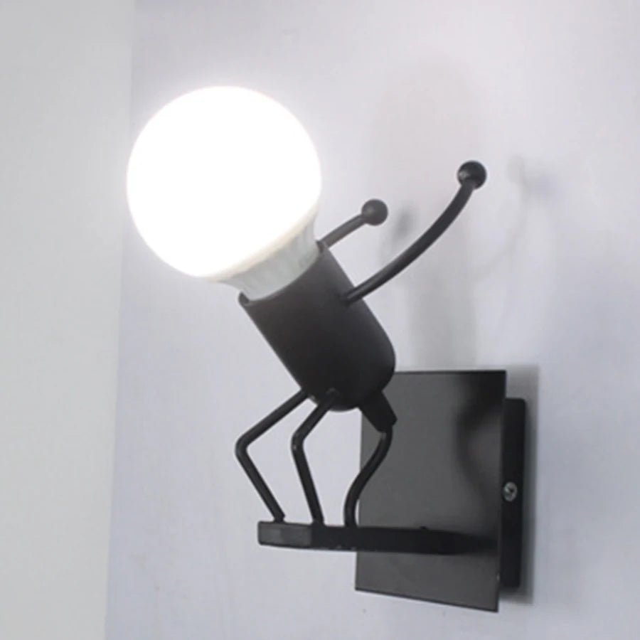 Creative Little Figurine on Swing Wall Sconces - Lumen Attic